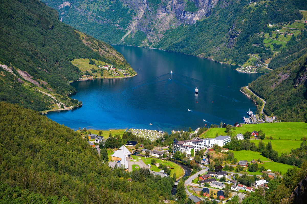The village of Geiranger with its harbour and the Geirangerfjord from above